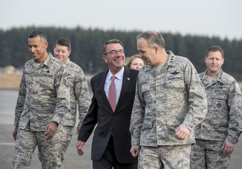 Secretary of Defense Ash Carter speaks with U.S. Air Force Lt. Gen. Jerry Martinez, U.S. Forces Japan and 5th Air Force commander, after arriving at Yokota Air Base, Japan, Dec. 5, 2016. (DOD photo by U.S. Air Force Tech. Sgt. Brigitte N. Brantley)