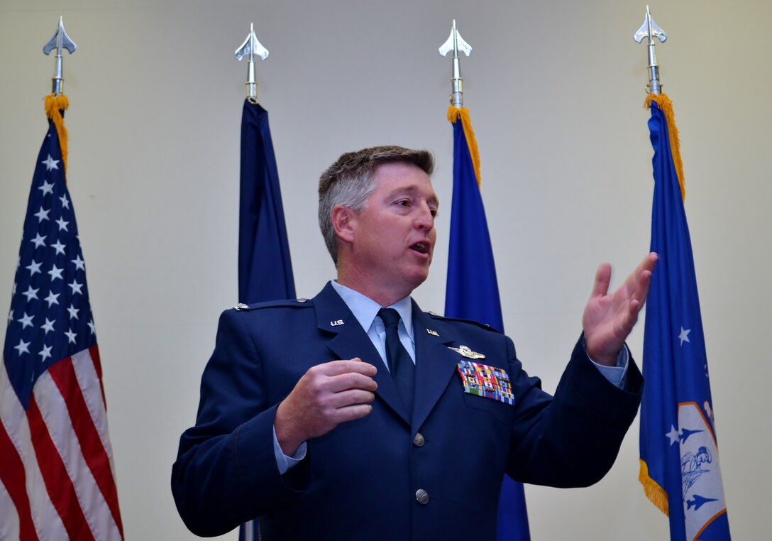 Newly-appointed 111th Operations Group  Commander Col. John O’Brien, addresses an audience of 111th Attack Wing members, family and friends for the first time after ceremoniously transitioning into his new position during the 111th OG Change of Command Ceremony conducted at the 111th Attack Wing headquarters, Horsham Air Guard Station, Pa., Dec. 3, 2016. O’Brien formerly held the position as commander of the 111th Operations Support Squadron. (U.S. Air National Guard photo by Tech. Sgt. Andria Allmond)