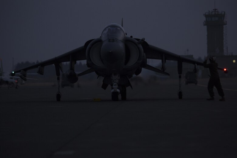 A U.S. Marine Corps AV-8B Harrier takes its spot on the flight line after arrival to Chitose, Japan, Dec. 5, 2016. Following the arrival of the squadron’s Harriers, a press conference was held to acknowledge questions pertaining to the aircraft and the Aviation Training Relocation Program. (U.S. Marine Corps photo by Lance Cpl. Joseph Abrego)
