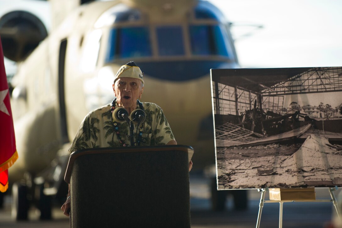 During a wreath-laying and tribute ceremony at Wheeler Army Airfield, Hawaii, Dec. 5, 2016, Pearl Harbor survivor Thomas Petso describes the Dec. 7, 1941, Japanese attack on the field. More than 30 men were killed and 50 injured at the airfield in the attack. DoD photo by Lisa Ferdinando 