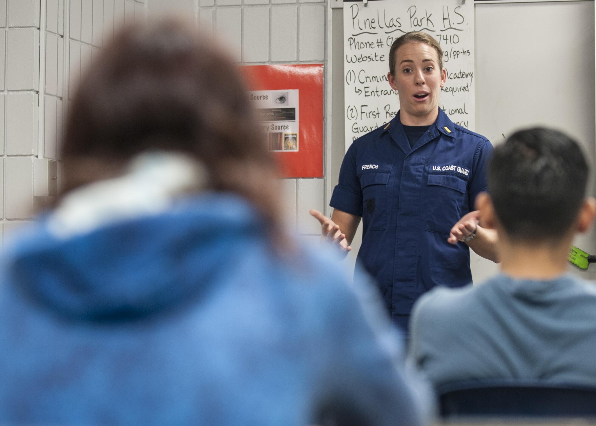 Ens. Diane French from Coast Guard Sector St. Petersburg shares her career experiences Wednesday, Nov. 16, 2016 with students from Morgan Fitzgerald Middle School in Largo, Florida during the third annual Great American Teach-In – Tour Across Pinellas. The Great American Teach-In is part of Pinellas County Schools’ annual education week celebration and it was created to introduce students to career options they might never have considered. U.S. Coast Guard photo by Petty Officer 1st Class Michael De Nyse