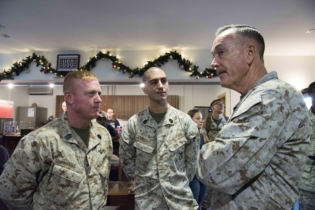 Marine Corps Gen. Joe Dunford, chairman of the Joint Chiefs of Staff, speaks with service members at Incirlik Air Base in Turkey, Dec. 5, 2016. Dunford and USO entertainers are visiting troops around the globe who are away from home over the holidays.