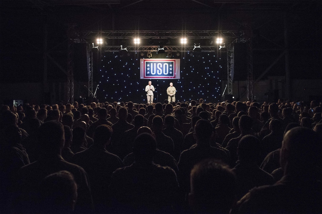 Marine Corps Gen. Joe Dunford, chairman of the Joint Chiefs of Staff, and Army Command Sgt. Maj. John W. Troxell, senior enlisted advisor to the chairman of the Joint Chiefs of Staff, address service members at Incirlik Air Base in Turkey during the USO Holiday Tour, Dec. 5, 2016. DoD photo by Navy Petty Officer 2nd Class Dominique A. Pineiro
	
