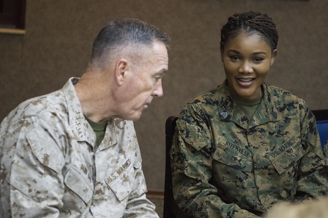 Marine Corps Gen. Joe  Dunford, chairman of the Joint Chiefs of Staff, speaks to a service member during his visit to Incirlik Air Base in Turkey, Dec. 5, 2016. Dunford and USO entertainers are visiting troops around the globe who are away from home over the holidays. DoD photo by Navy Petty Officer 2nd Class Dominique A. Pineiro 