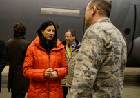 Members of the Landstuhl and Weilerbach Union Community Councils gather near a C-130J Super Hercules as Brig. Gen. Richard G. Moore Jr., 86th Airlift Wing commander, and Chief Master Sgt. Aaron Bennett, 86th AW command chief, welcome them during a base tour at Ramstein Air Base, Germany, Dec. 2, 2016. The tour was part of Ramstein’s community relations program aimed at enriching relationships with local community leaders. (U.S. Air Force photo by Tech. Sgt. Sara Keller)