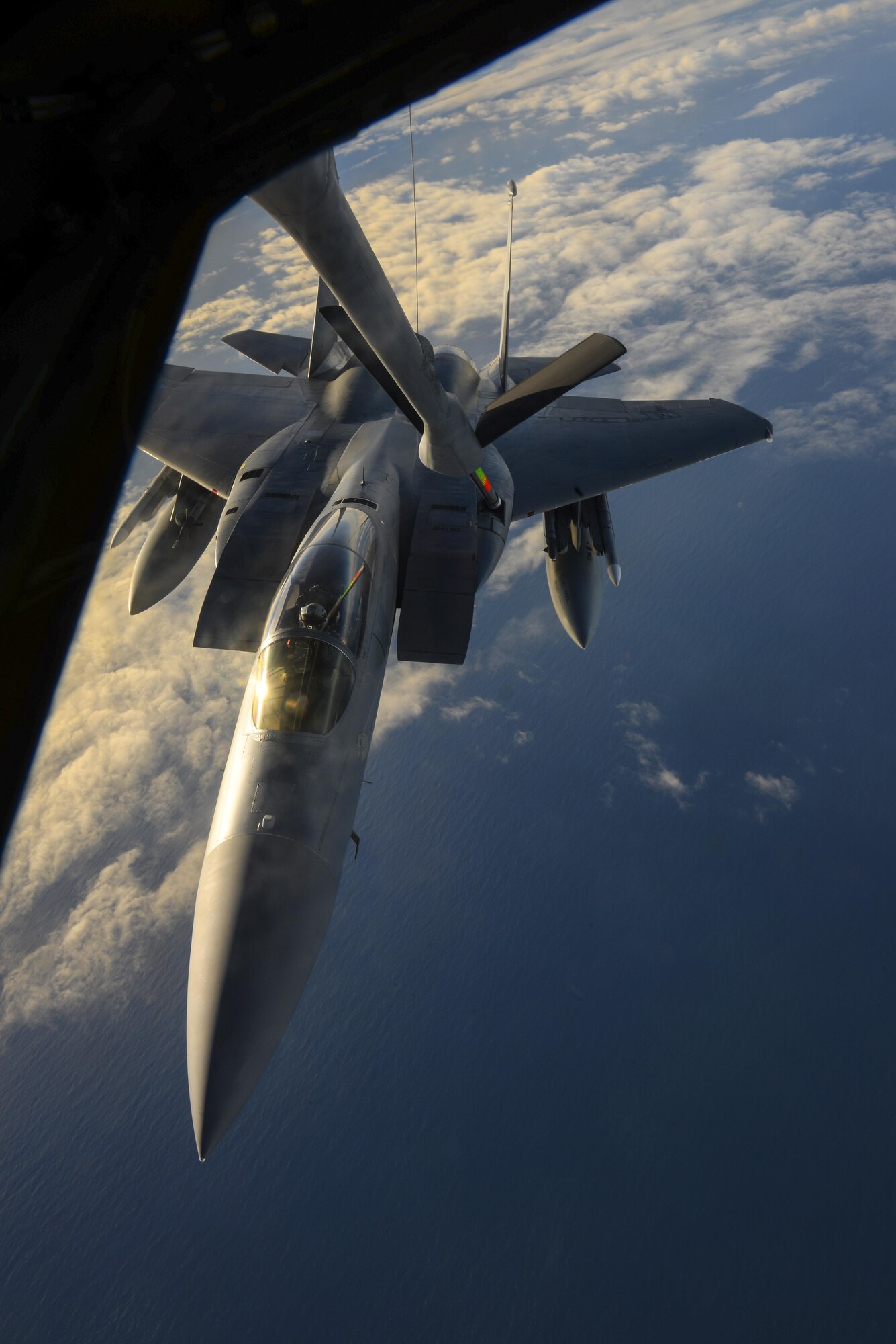 A U.S. Air Force F-15D Eagle, assigned to the 48th Fighter Wing from RAF Lakenheath, England, receives fuel from a KC-135 Stratotanker assigned to the 349th Air Mobility Wing from Beale Air Force Base, Calif., Dec. 2, 2016, over the Atlantic Ocean. U.S. Air Force Col. Thomas Torkelson, 100th Air Refueling Wing commander at RAF Mildenhall, England, flew in an F-15 as a part of a familiarization flight to enable him to experience what it’s like to receive fuel from a KC-135. (U.S. Air Force photo by Staff Sgt. Micaiah Anthony)