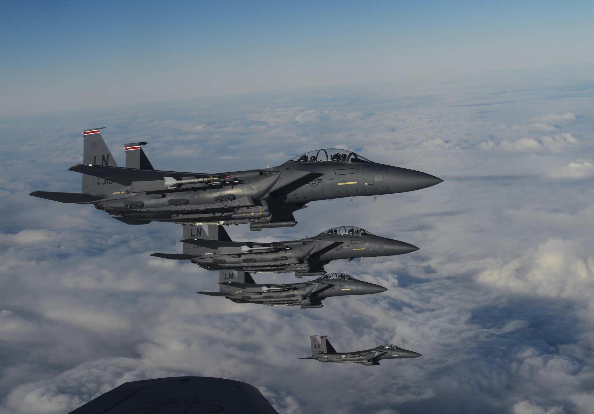 U.S. Air Force F-15D Eagles assigned to the 48th Fighter Wing from RAF Lakenheath, England, fly in formation off of the wing of a KC-135 Stratotanker assigned to the 349th Air Mobility Wing from Beale Air Force Base, Calif., Dec. 2, 2016, over the Atlantic Ocean. The F-15 Eagle is an all weather, extremely maneuverable tactical fighter designed to permit the Air Force to gain and maintain air supremacy over the battlefield. (U.S. Air Force photo by Staff Sgt. Micaiah Anthony)