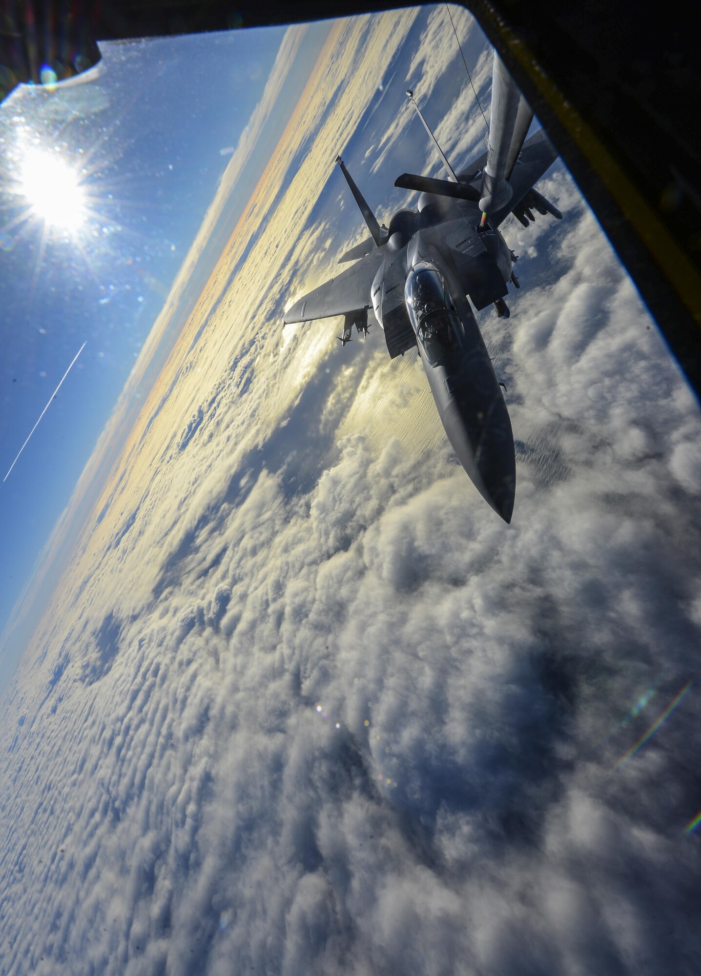 A U.S. Air Force F-15D Eagle assigned to the 48th Fighter Wing from RAF Lakenheath, England, takes fuel from a KC-135 Stratotanker assigned to the 349th Air Mobility Wing from Beale Air Force Base, Calif., Dec. 2, 2016, over the Atlantic Ocean. U.S. Air Force Col. Thomas Torkelson, 100th Air Refueling Wing commander at RAF Mildenhall, England, flew with the 48th FW to experience their mission of providing worldwide responsive combat air power and support. (U.S. Air Force photo by Staff Sgt. Micaiah Anthony) 