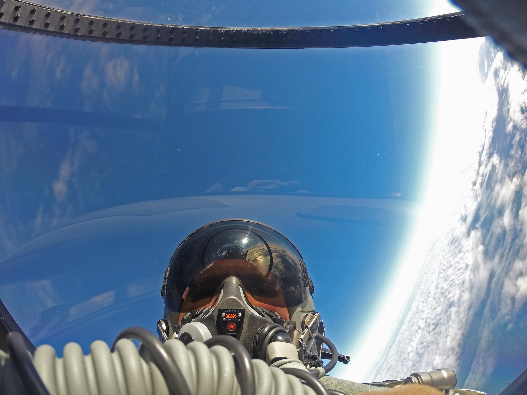 U.S. Air Force Col. Thomas Torkelson, 100th Air Refueling Wing commander at RAF Mildenhall, England, takes a “selfie” in the back of an F-15D Eagle assigned to the 48th Fighter Wing from RAF Lakenheath, England, Dec. 2, 2016, over the Atlantic Ocean. Torkelson flew with the 48th Fighter Wing to experience first-hand their role in securing peace through strength. (U.S. Air Force photo by Col. Thomas Torkelson)