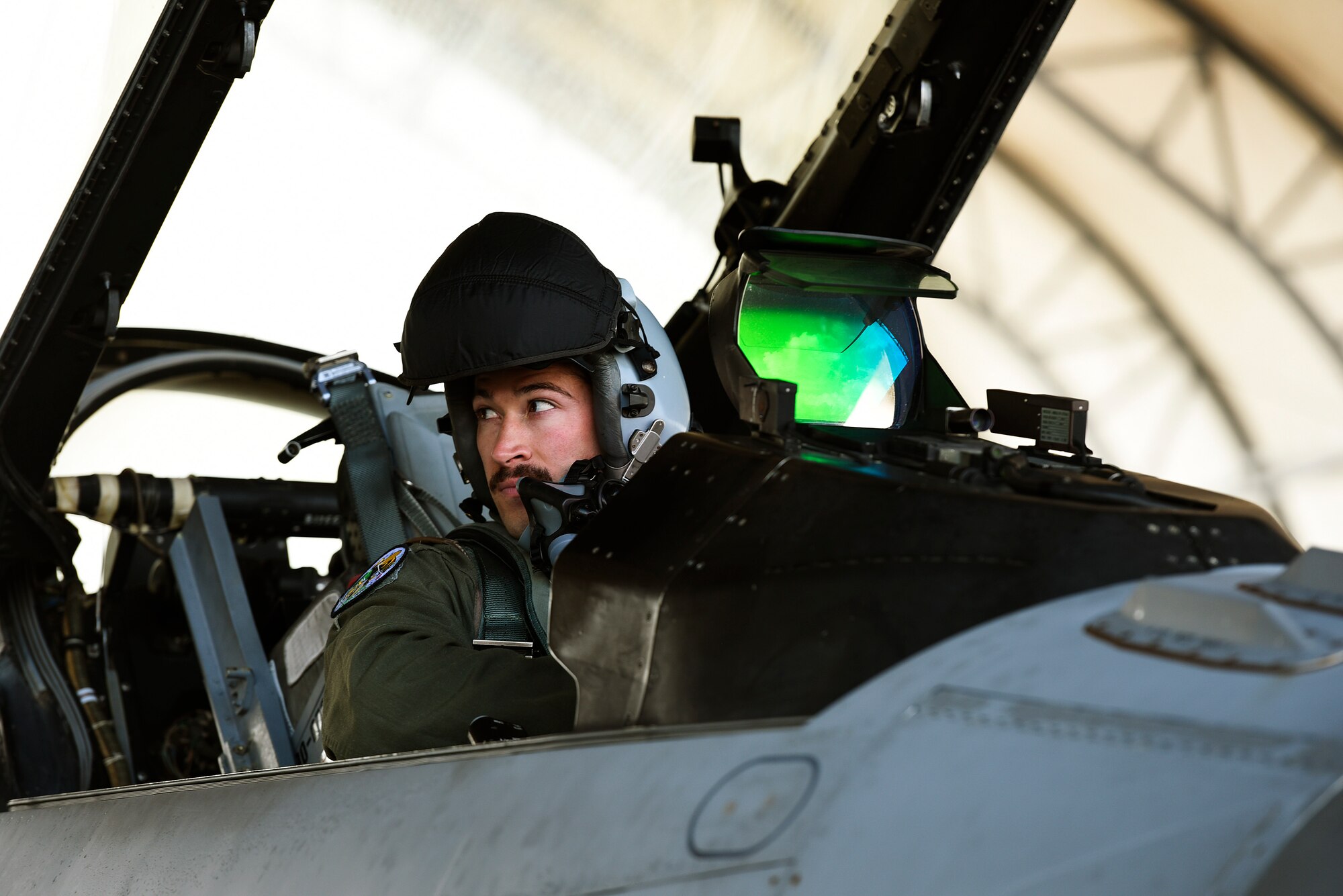 U.S. Air Force Capt. Drew Hauber, an F-16 Fighting Falcon pilot assigned to the 112th Expeditionary Fighter Squadron, conducts preflight checks Feb. 22, 2016, during exercise COPE NORTH 16 at Andersen Air Force Base, Guam. Training exercises such as CN16, allow the U.S., Japan and Australia air forces to develop combat capabilities, enhancing air superiority, electronic warfare, air interdiction, tactical airlift and aerial refueling. (U.S. Air National Guard photo by Staff Sgt. Shane Hughes/Released)