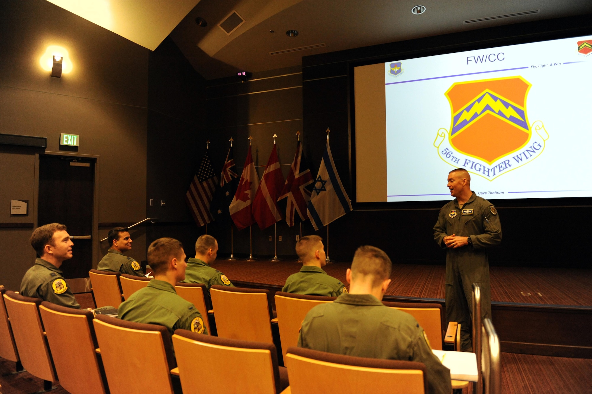Brig. Gen. Brook Leonard, 56th Fighter Wing commander, welcomes the first class of F-35 Lightning II student pilots to train under the newly made F-35 syllabus Dec. 5, 2016 in the F-35 Academic Training Center auditorium at Luke Air Force Base, Ariz. The syllabus was created to teach pilots without prior fighter jet experience how to fly the F-35. (U.S. Air Force photo by Staff Sgt. Grace Lee) (Released)