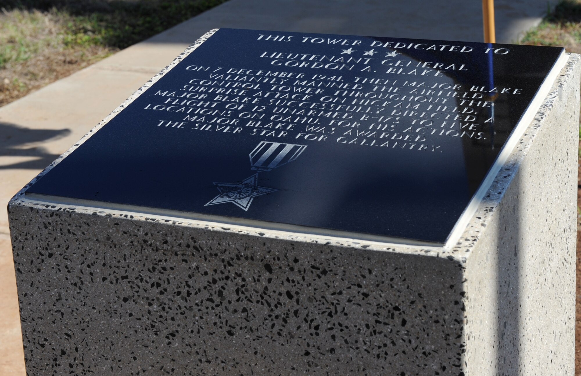 A memorial plaque was unveiled during the tower dedication ceremony in honor of Lt. Gen. Gordon A. Blake, at Joint Base Pearl Harbor-Hickam Dec. 5, 2016. During the attack on Pearl Harbor Dec. 7, 1941, then Major Blake, was the base operations officer at Hickam Field and earned the Silver Star for his actions during the attack. Dec. 7, 2016 marks the 75th anniversary of the attacks and the U.S. military and State of Hawaii are hosting a series of remembrance events to honor the Pacific Theater's veterans. (U.S. Air Force photo by Tech. Sgt. Taylor Worley)