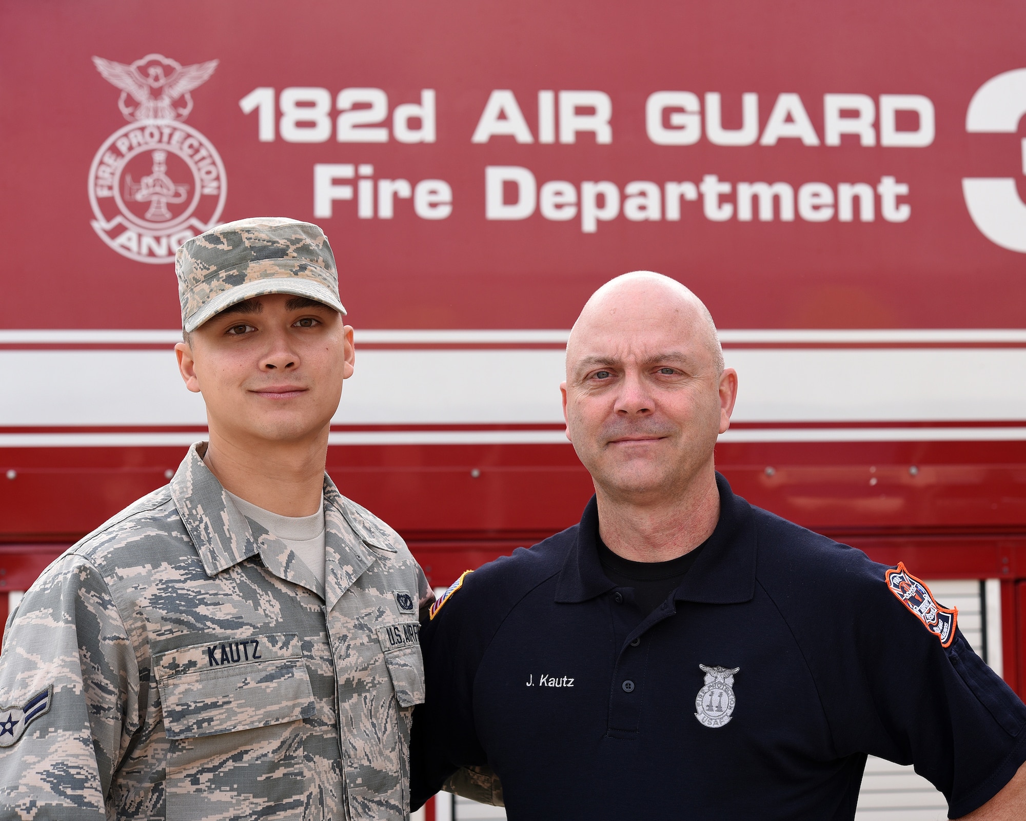 As John Kautz (right) an Illinois Air National Guard firefighter prepares for retirement, his son, Airman 1st Class Shawn Kautz, has already begun following his path to an identical career at the 182nd Airlift Wing in Peoria, Illinois. 