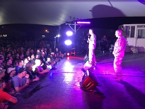 Chairman of the Joint Chiefs of Staff Marine Corps Gen. Joe Dunford and his senior enlisted advisor, Army Command Sgt. Maj. John W. Troxell, speak to the troops before the USO show at al Udeid Airt Base, Qatar, Dec. 6, 2016. DoD photo by Jim Garamone