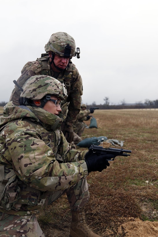 Spc. Courtney Holloway, a Signal Support Systems Specialist, with the 316th Sustainment Command (Expeditionary), an Army Reserve unit from Coraopolis, Pa., reloads an M9 pistol at a qualification and familiarization range Dec. 6, 2016, at Fort Hood, Tx.
(U.S. Army photo by Sgt. Christopher Bigelow)