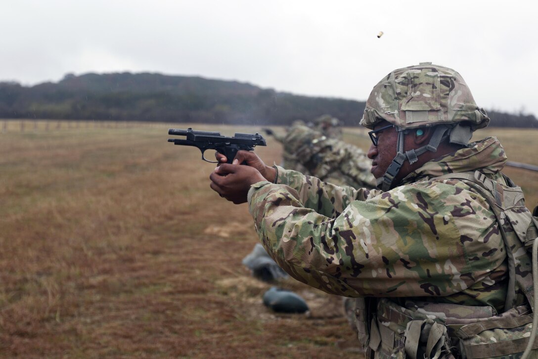 Pfc. Tyrel Smithson, an Army Reserve Paralegal from Pittsburgh Pa., with the 316th Sustainment Command (Expeditionary), an Army Reserve unit from Coraopolis, Pa., fires an M9 pistol at a qualification and familiarization range Dec. 6, 2016, at Fort Hood, Tx.
(U.S. Army photo by Sgt. Christopher Bigelow)