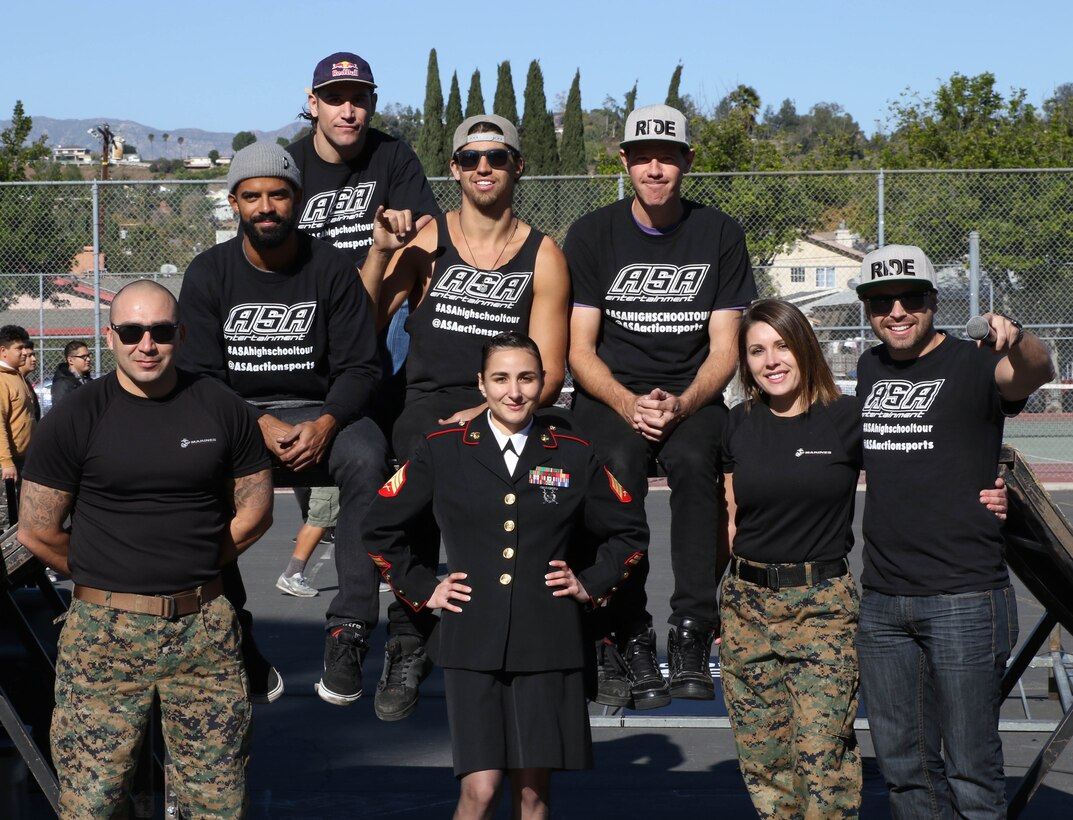 Marines from Recruiting Station Los Angeles and entertainers from the Action Sports Association High School tour pose for a photo after an event at Franklin High School in Los Angeles, Calif., Dec. 2, 2016. The ASA High School tour is a high-energy action sports circuit that visits cities across the United States supporting the Anti-Defamation League’s No Place for Hate campaign and the campaign for Tobacco-Free Kids. (Courtesy Photo/Released) 