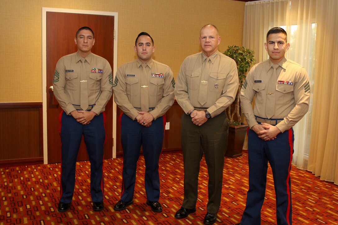 (From left to right) Gunnery Sergeant Edwin O. Salvatierra, Staff Sgt. Joshua C. Gonzalez, Commandant of the Marine Corps Gen. Robert B. Neller, and Sgt. David Gonzalez, pose for a photo after visiting with the Commandant in Simi Valley, Calif., Dec. 3, 2016. The commandant met with Marines from RS Los Angeles to discuss topics relating to recruiting. (U.S. Marine Corps photo by Staff Sgt. Alicia R. Leaders/Released)  