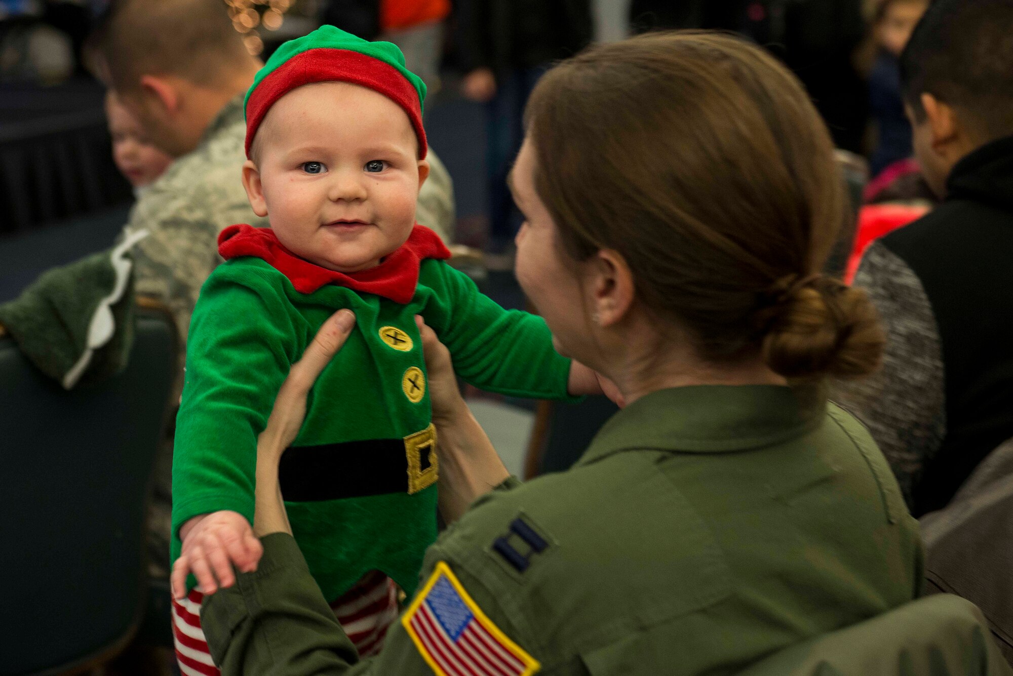 Many Scott Air Force Base service members and families attended the annual holiday party and tree lighting event Nov. 30, 2016. During the party, families were able to meet Santa and Mrs. Claus, participate in crafts, listen to the Scott AFB Youth Program's Choir sing holiday songs, and pick out a Christmas tree donated by Trees for Troops. Thank you to the coordinators and all the volunteers who made this event an enjoyable and memorable evening for so many people. (U.S. Air Force photo by Senior Airman Megan Friedl)