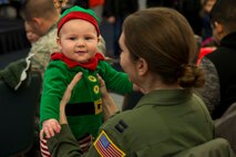 Many Scott Air Force Base service members and families attended the annual holiday party and tree lighting event Nov. 30, 2016. During the party, families were able to meet Santa and Mrs. Claus, participate in crafts, listen to the Scott AFB Youth Program's Choir sing holiday songs, and pick out a Christmas tree donated by Trees for Troops. Thank you to the coordinators and all the volunteers who made this event an enjoyable and memorable evening for so many people. (U.S. Air Force photo by Senior Airman Megan Friedl)