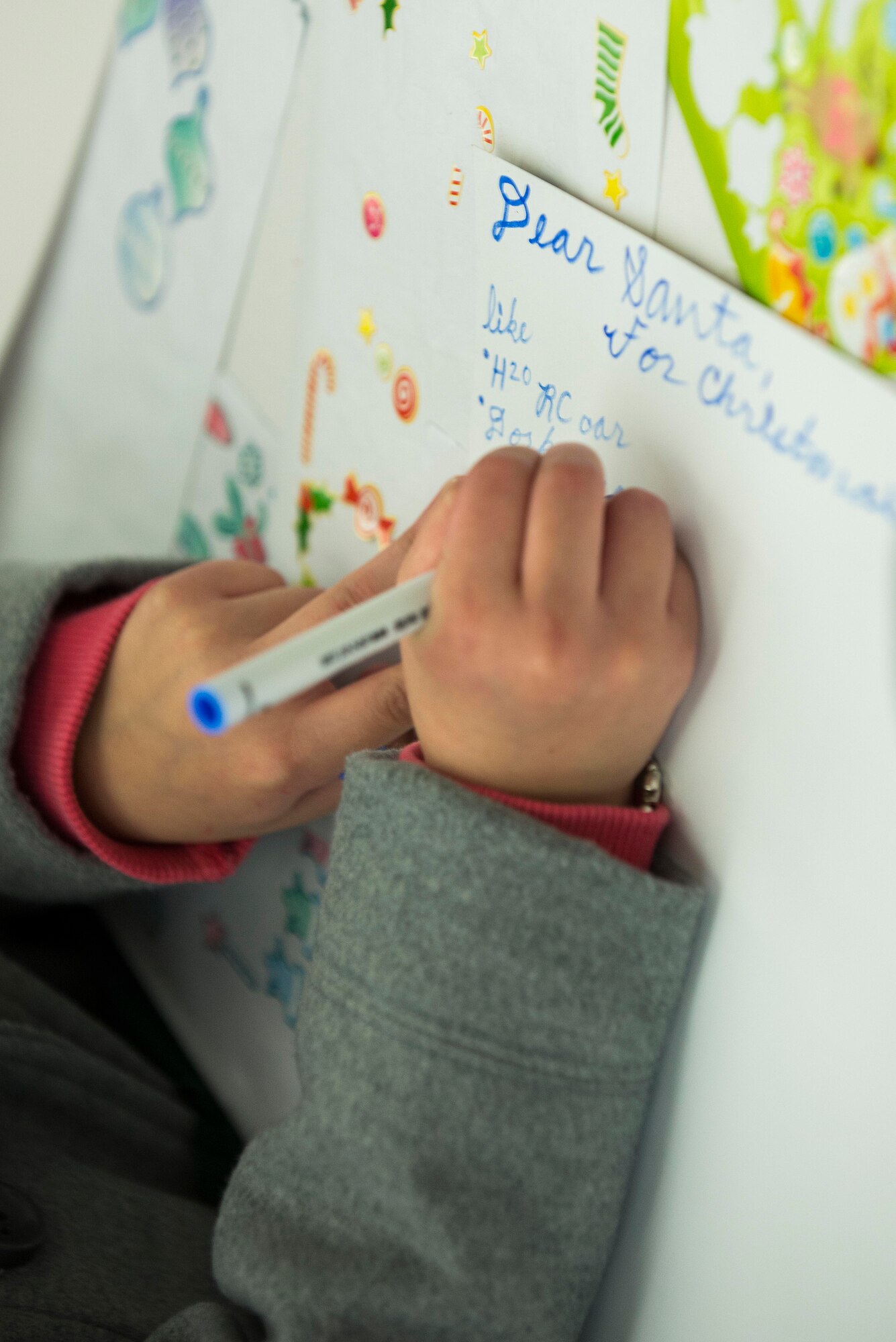 Many Scott Air Force Base service members and families attended the annual holiday party and tree lighting event Nov. 30, 2016. During the party, families were able to meet Santa and Mrs. Claus, participate in crafts, listen to the Scott AFB Youth Program's Choir sing holiday songs, and pick out a Christmas tree donated by Trees for Troops. Thank you to the coordinators and all the volunteers who made this event an enjoyable and memorable evening for so many people. (U.S. Air Force photo by Senior Airman Megan Friedl)