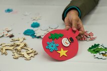 Many Scott Air Force Base service members and families attended the annual holiday party and tree lighting event Nov. 30, 2016. During the party, families were able to meet Santa and Mrs. Claus, participate in crafts, listen to the Scott AFB Youth Program's Choir sing holiday songs, and pick out a Christmas tree donated by Trees for Troops. Thank you to the coordinators and all the volunteers who made this event an enjoyable and memorable evening for so many people. (U.S. Air Force photo by Senior Airman Megan Friedl)