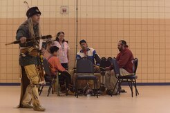 The chief of the Wolf Creek Cherokee Tribe performs during the National American Indian Heritage Pow Wow at Joint Base Langley-Eustis, Va., Nov. 30, 2016. After each performance, a description was given as to what it meant and who it was designed for. (U.S. Air Force photo by Senior Airman Kimberly Nagle)