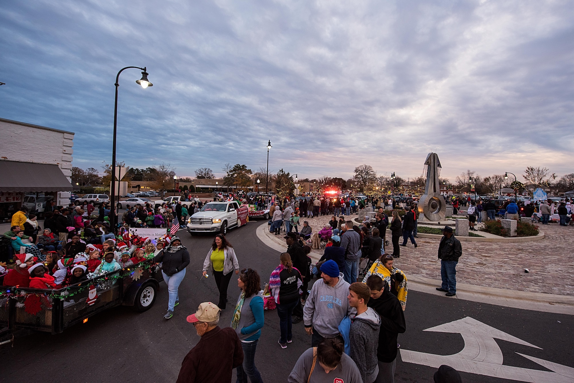 More than 500 people watch as floats drive by during a Christmas Parade, Dec. 3, 2016, in Downtown Goldsboro, North Carolina. The parade began with Col. Christopher Sage, 4th Fighter Wing commander, who was the grand marshal of the parade. (U.S. Air Force photo by Airman Shawna L. Keyes)