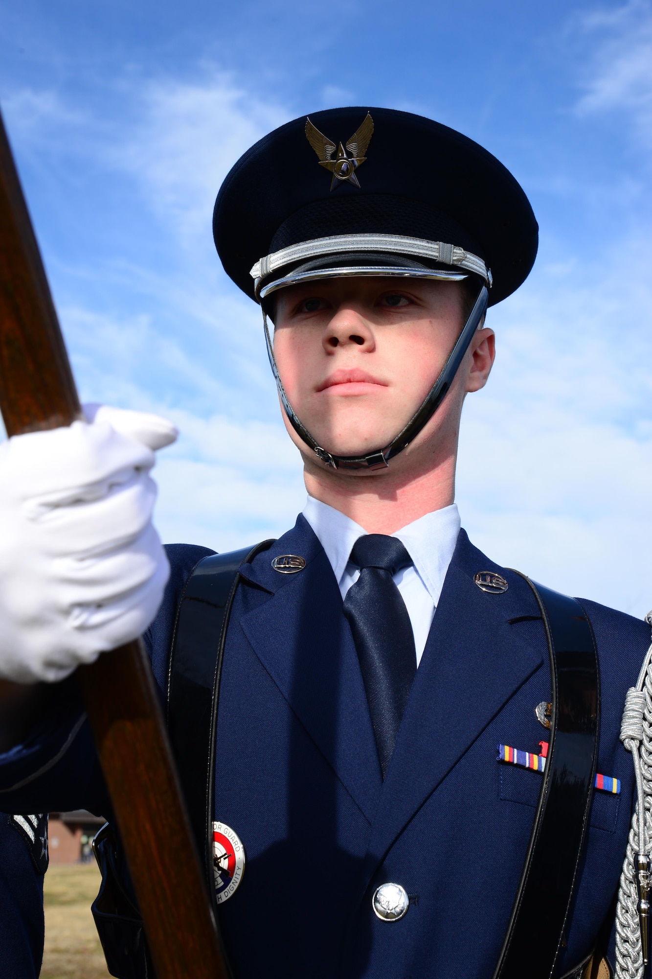 Airman 1st Class Taylor Brown, 741st Maintenance Squadron power refrigeration and electrical lab technician and prior member of the Malmstrom Honor Guard, presents the Air Force flag during a simulated color team Nov. 4, 2016, at Malmstrom Air Force Base, Mont. Brown recently earned the Base Honor Guard member award for the third quarter for going above and beyond his peers. (U.S. Air Force photo/Airman 1st Class Magen M. Reeves)