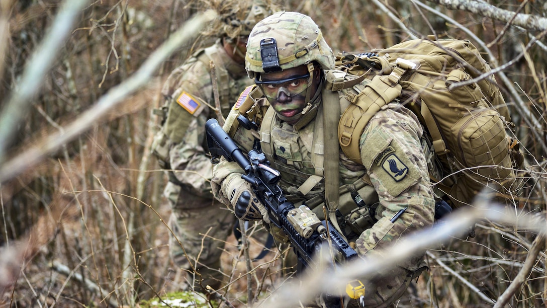 <strong>Photo of the Day: Dec. 7, 2016</strong><br/><br />Soldiers move through the woods during a live-fire exercise as part of Exercise Mountain Shock in Pocek Range in Slovenia, Dec. 5, 2016. U.S. and Slovenian forces participated in the emergency response deployment exercise, which focuses on rapid deployment and team cohesion with weapon systems tactics and procedures. The U.S. soldiers are paratroopers assigned to 1st Squadron, 91st Cavalry Regiment, 173rd Airborne Brigade. Army photo by Davide Dalla Massara<br/><br /><a href="http://www.defense.gov/Media/Photo-Gallery?igcategory=Photo%20of%20the%20Day"> Click here to see more Photos of the Day. </a> 