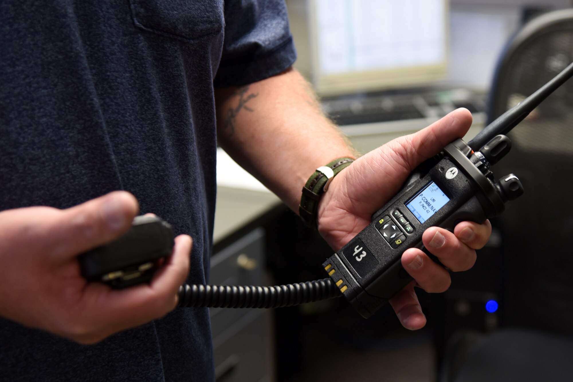 PETERSON AIR FORCE BASE, Colo. – Brian Tillman, 21st Communications Squadron trunked land mobile radio technician, holds one of the new multi-band radios acquired during the second upgrade to the Trunked Land Mobile Radio at Peterson Air Force Base, Colo., Dec. 2, 2016. Falling in line with the Commander’s intent, the TLMR allows the 21st Space Wing to edge closer to its goal of saving lives and being good stewards to Airmen and the Colorado Springs community. (U.S. Air Force photo by Airman 1st Class Dennis Hoffman)