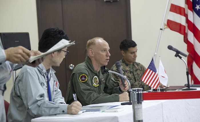 U.S. Marine Corps Lt. Col. John D. Ferguson, commanding officer of Marine Attack Squadron (VMA) 542, speaks during a press conference after the arrival of the squadrons AV-8B Harriers to Chitose Air Base, Japan, Dec. 5, 2016. The press conference informed the local community about the significance and missions of the Aviation Training Relocation Program for the U.S. and Japan governments. (U.S. Marine Corps photo by Cpl. James A. Guillory)
