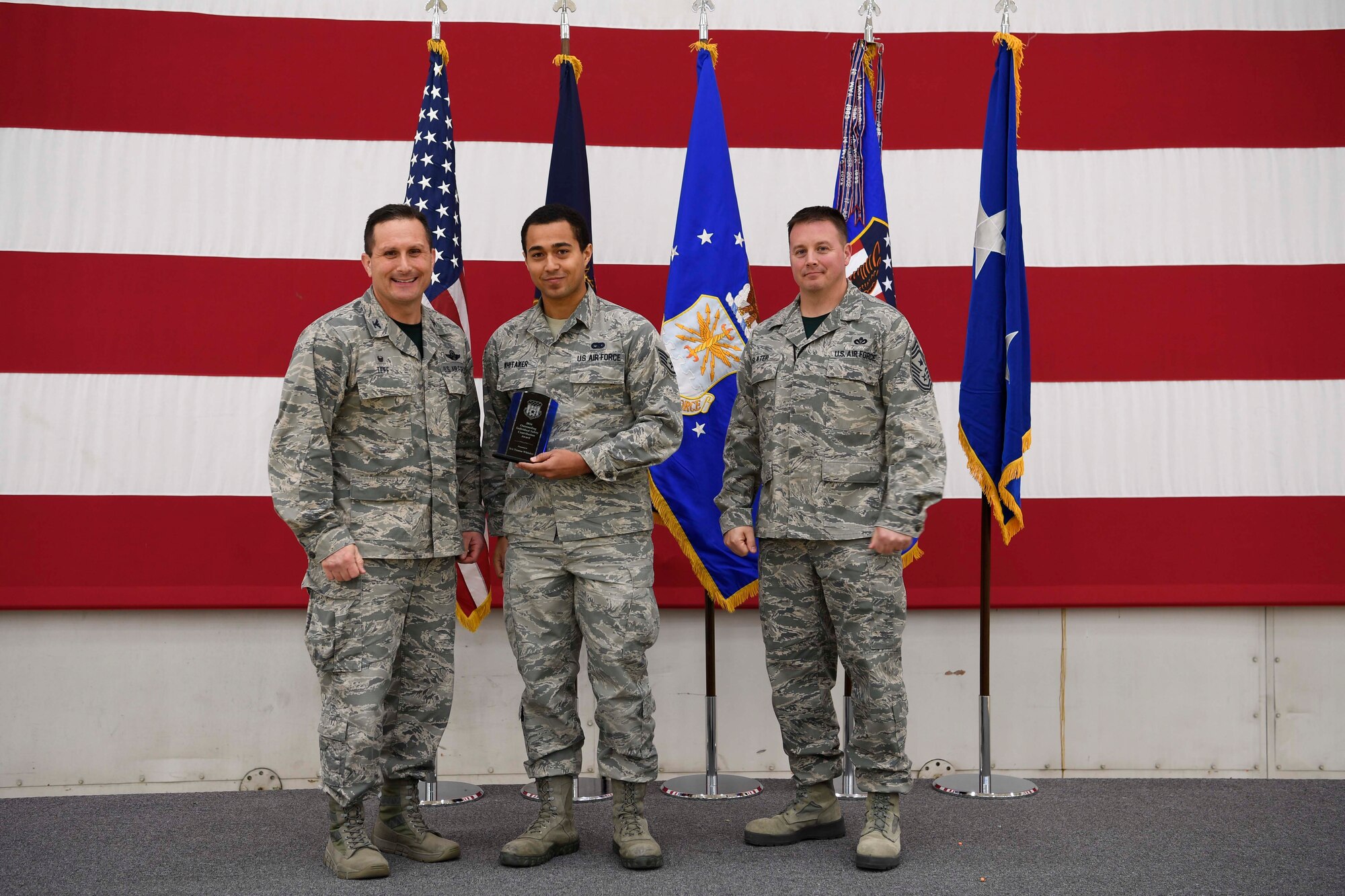 The 110th Attack Wing, Battle Creek, Mich., had their annual town hall meeting December 3, 2016. During this event Senior Airman Trenton Whitaker is being recognized for Outstanding Individual Safety Contributions.  Senior Airman Whitaker is from the 110th Operational Support Squadron. This award recognizes any 110th Attack Wing member that has significantly contributed to the base’s safety culture beyond his or her work-center. Senior Airman Whitaker was instrumental in safeguarding the Wing’s first ground control station. He stepped in at a critical moment during offloading operations to properly secure restraint while the GCS was being transferred. His assertive action was further essential in safely positioning the critical asset into the new facility thereby greatly contributing to the unit’s push toward initial operating capability in the MQ-9. (U.S. Air National Guard photo by Tech. Sgt. Jason A. Boyd/Released)