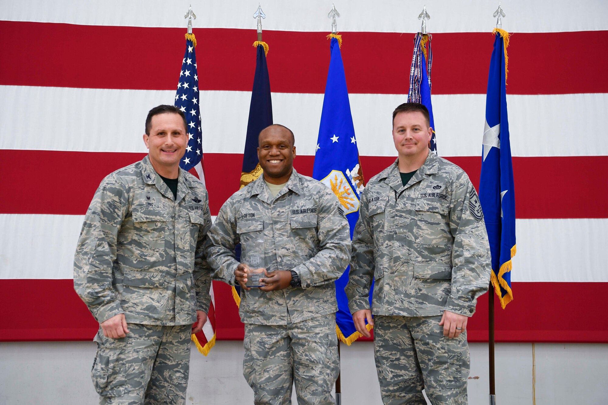 The 110th Attack Wing, Battle Creek, Mich., had their annual town hall meeting December 3, 2016. During this event Senior Airman Javonte Lofton was awarded the 110th Attack Wing Airman of the Year.  He is assigned to the 110th  Logistics Readiness Squadron as a Material Management Specialist.  Senior Airman Lofton maintained 100% inventory for over 450 small arms and light weapons valued at over $323K.  He enabled war fighter capability by expeditiously issuing 100% of mobility equipment for 150 AEF deploying personnel.  (U.S. Air National Guard photo by Tech. Sgt. Jason A. Boyd/Released