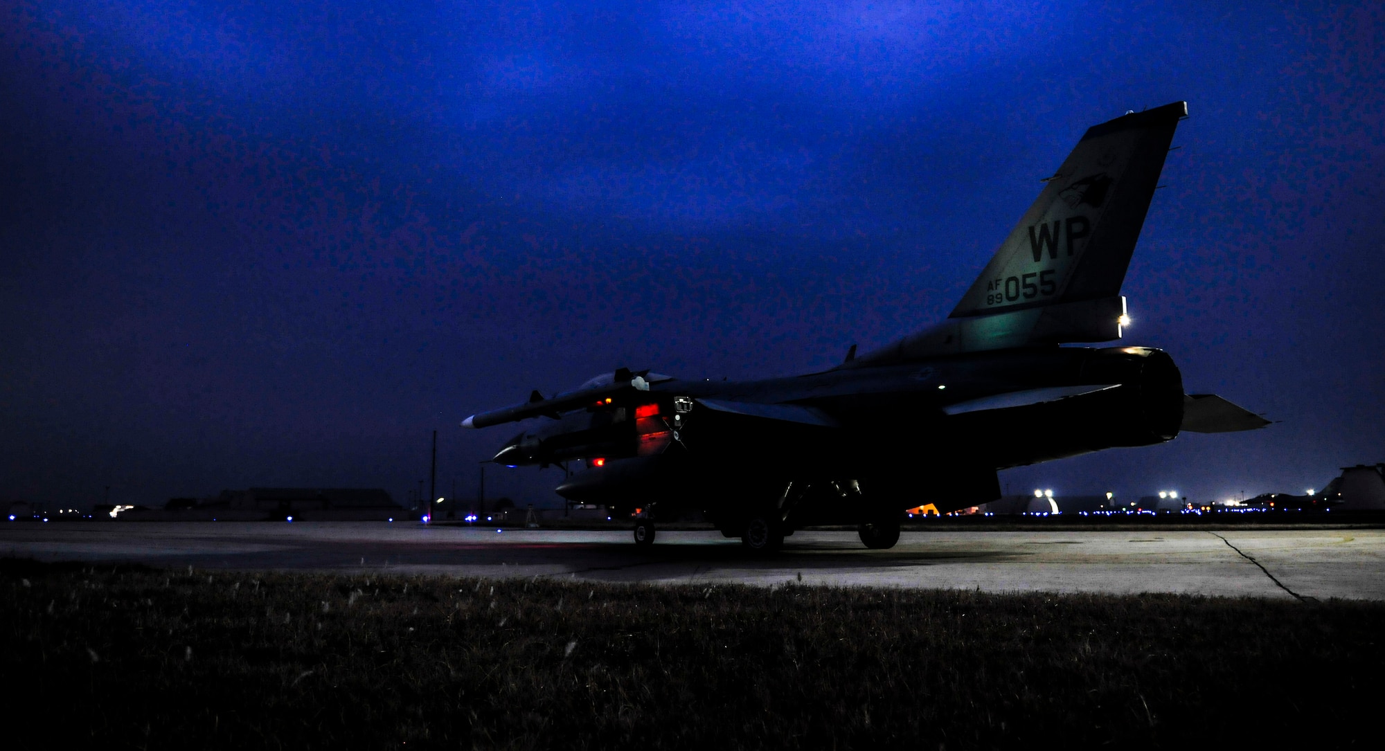 U.S. Air Force Capt. Erik Kitaif, 35th Fighter Squadron pilot, parks an F-16 Fighting Falcon outside of its hanger bay at Kunsan Air Base, Republic of Korea, Dec. 4, 2016. Airmen at Kunsan train to employ airpower to deter aggression, preserve the Armistice and defend the ROK. (U.S. Air Force photo by Senior Airman Colville McFee/Released)
