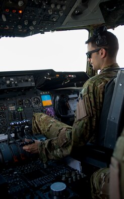 U.S. Air Force Capt. Mike, a KC-10 Extender pilot deployed in support of Operation Inherent Resolve, flies during a refueling mission near Mosul, Iraq, Nov. 20, 2016. KC-10 aircrews leverage the aircraft's unique ability to supply fuel using both the centerline refueling boom and drogue-and-hose system during the same mission, meaning they can supply a wide range of fighters, bombers and intelligence, surveillance and reconnaissance aircraft without landing to switch systems. (U.S. Air Force photo by Staff Sgt. R. Alex Durbin)
