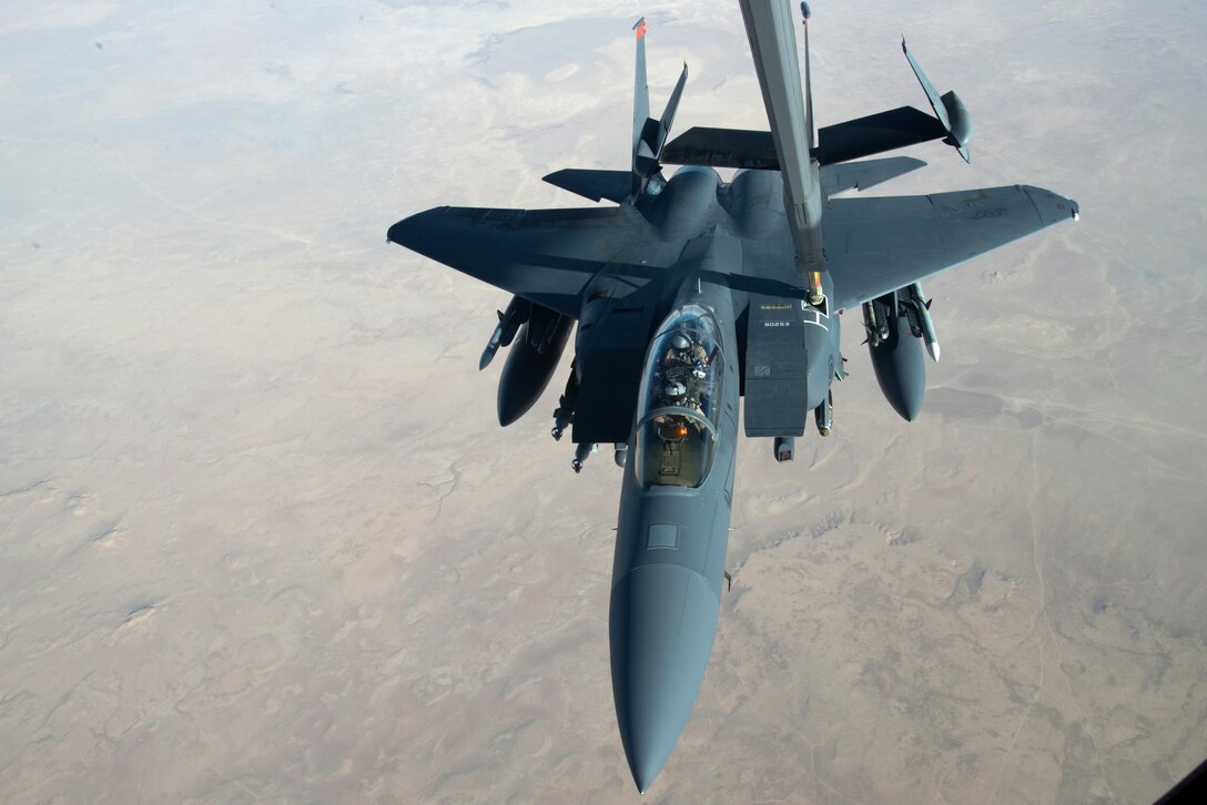 A U.S. Air Force F-15E Strike Eagle receives fuel from a KC-10 Extender centerline refueling boom near Mosul, Iraq, Nov 20, 2016. The F-15E Strike Eagle is a dual-role fighter designed to perform air-to-air and air-to-ground missions. An array of avionics and electronics systems gives the F-15E the capability to fight at low altitude, day or night, and in all weather. (U.S. Air Force photo by Staff Sgt. R. Alex Durbin)
