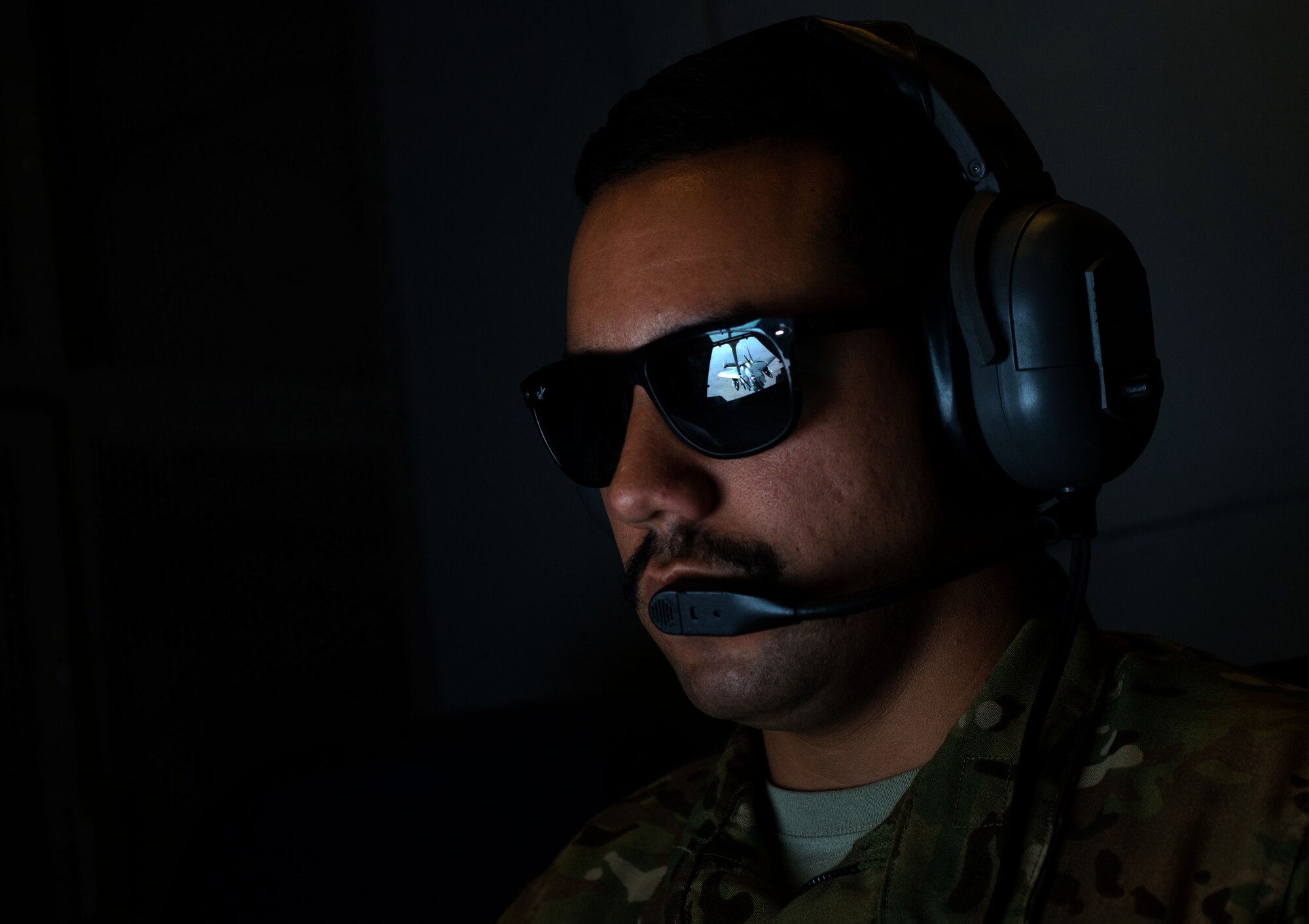 U.S. Air Force Staff Sgt. Michael, a KC-10 Extender boom operator deployed in support of Operation Inherent Resolve, refuels an F-15E Strike Eagle near Mosul, Iraq, Nov. 20, 2016. Using either an advanced aerial refueling boom, or a hose and drogue centerline refueling system, the KC-10 can refuel a wide variety of U.S. and allied military aircraft within the same mission. (U.S. Air Force photo by Staff Sgt. R. Alex Durbin)