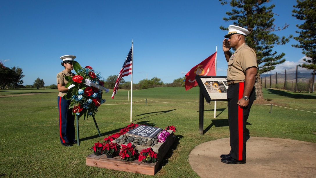 U.S. Marine Brig. Gen. Brian Cavanaugh, deputy commander, U.S. Marine Corps Forces, Pacific, salutes as a wreath is laid for fallen Marines at Barber's Point Golf Course in Kapolei, Hawaii, Dec. 6, 2016. The commemoration was to honor the four Marines killed in the attack at Marine Corps Air Station Ewa Dec. 7, 1941 during the attack on Pearl Harbor and Oahu. The U.S. military and the State of Hawaii are hosting a series of remembrance events to honor the courage and sacrifices of Pacific Theater veterans. 