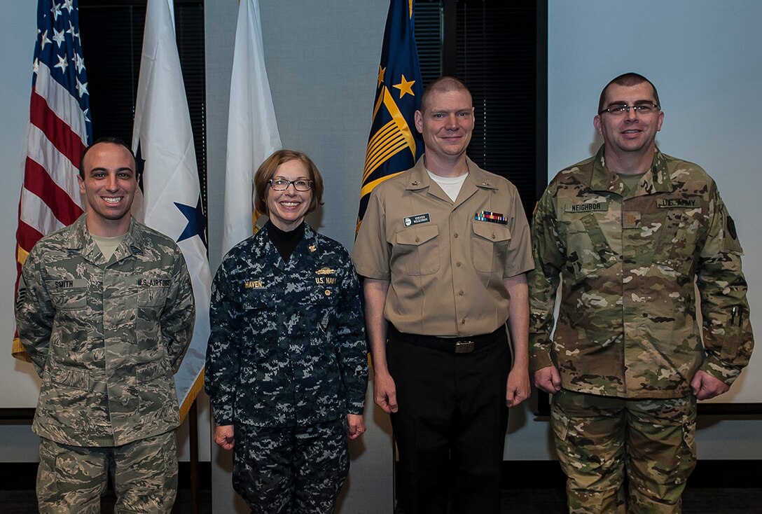 During the Dec. 2 Joint Forces Operational Summit in Columbus, Ohio, the organization announced its Reservist of the Year award. (from left) Air Force Master Sgt. Matthew Smith, 2016 DLA Reservist of the Year; DLA Joint Reserve Forces (J-9) Director Navy Rear Adm. Deborah Haven; nominees Navy Petty Officer Steven Wilkinson and Army Maj Bruce Neighbor.