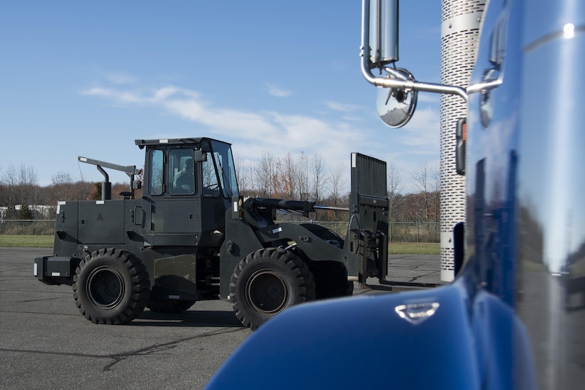 Staff Sgt. Ryan Mack, 87th Logistics Readiness Squadron vehicle operator, drives a forklift during the ground transportation rodeo Dec. 2, 2016, at Dover Air Force Base, Del. Mack and several other members of the 87th LRS traveled from Joint Base McGuire-Dix-Lakehurst, N.J., to compete in the event. (U.S. Air Force photo by Senior Airman Aaron J. Jenne)