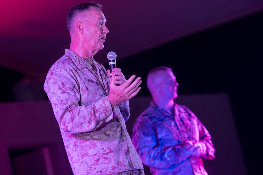 Marine Corps Gen. Joe Dunford, chairman of the Joint Chiefs of Staff, and his senior enlisted advisor, Army Command Sgt. Maj. John W. Troxell, speak to the troops before the USO show at al Udeid Air Base, Qatar, Dec. 6, 2016. DoD photo by Navy Petty Officer 2nd Class Dominique A. Pineiro