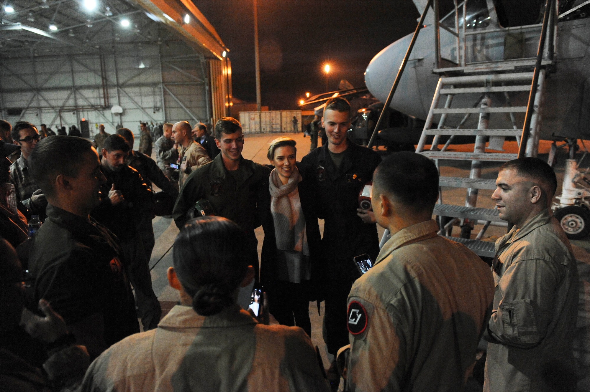 Actress Scarlett Johansson stands with U.S. service members for a photo Dec. 5, 2016, at Incirlik Air Base, Turkey. This trip was Johansson’s first time on a USO Holiday Visit, a tradition that goes back to former chairman of the Joint Chiefs of Staff, U.S. Air Force Gen. Richard B. Myers in 2003. (U.S. Air Force photo by Airman 1st Class Devin M. Rumbaugh)