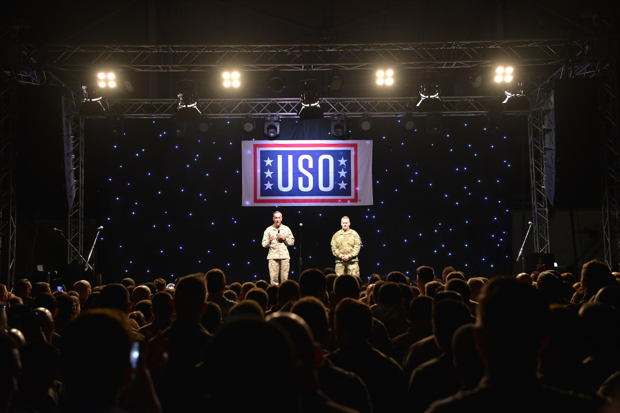 U.S. Marine Corps Gen. Joseph F. Dunford, Jr., chairman of the Joint Chiefs of Staff, and U.S. Army Command Sgt. Maj. John W. Troxell, senior enlisted advisor to the chairman of the Joint Chiefs of Staff, address service members during the 2016 USO Holiday Visit Dec. 5, 2016, at Incirlik Air Base, Turkey. Dunford and Troxell visited Incirlik as a part of the 2016 USO Holiday Visit, a tradition that started in 2003. (U.S. Air Force photo by Senior Airman John Nieves Camacho)