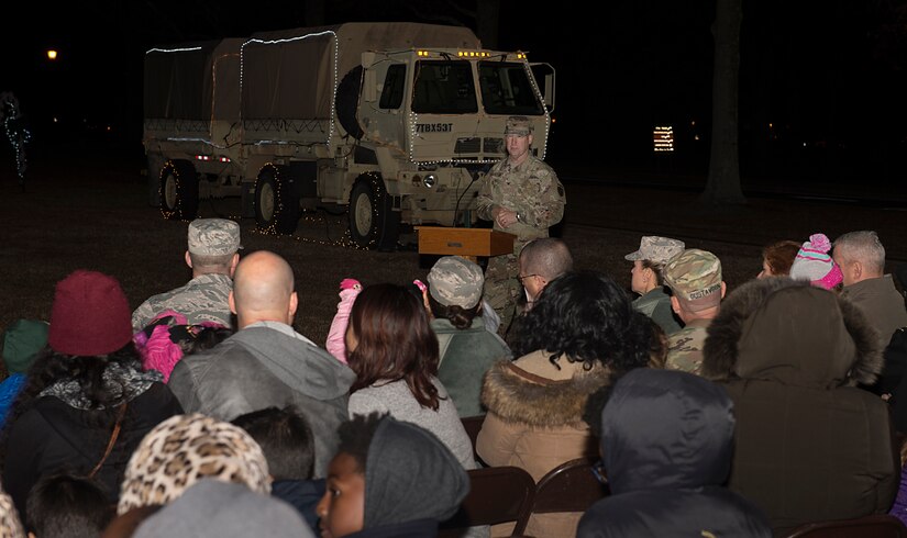 U.S. Army Col. Ralph Clayton III, 733rd Mission Support Group commander, speaks during the 61st annual Holiday Tree Lighting celebration at Joint Base Langley-Eustis, Va., Dec. 2, 2016.  The event is hosted each year at the beginning of December to welcome the holiday season and bring U.S. service members and their families together. (U.S. Air Force photo by Airman 1st Class Derek Seifert)