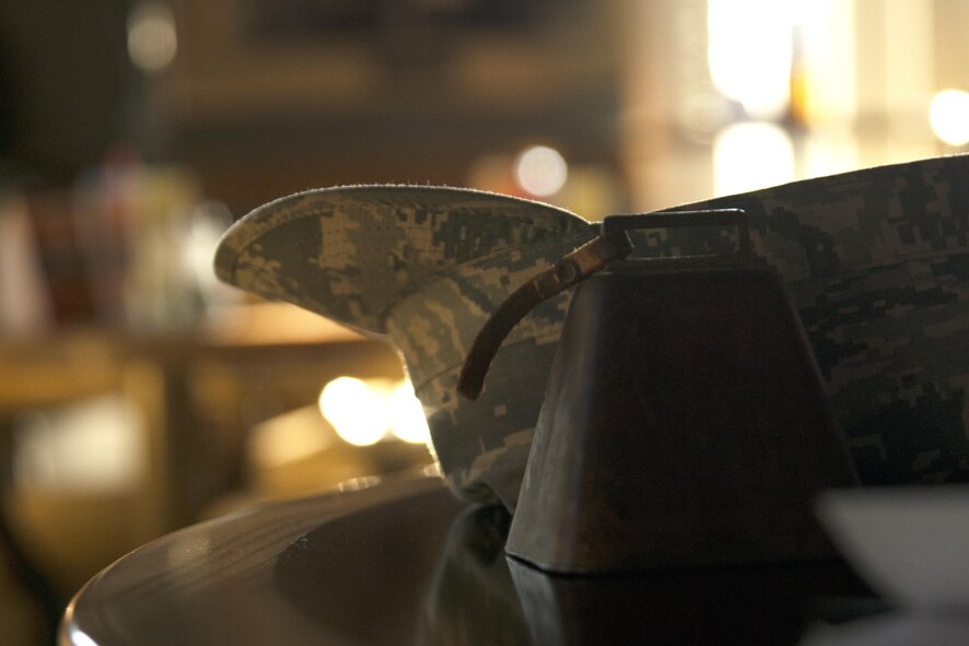 A bell rests on a table after a speed networking event in the Carolina Skies Club and Conference Center at Shaw Air Force Base, S.C., Dec. 1, 2016. Chief Master Sgt. Steven Mullens, 20th Mission Support Group superintendent, used the bell to signal attendees to rotate at the end of each timed session, during which the attendees exchanged information about what they do for the base. (U.S. Air Force photo by Airman 1st Class Kathryn R.C. Reaves)
