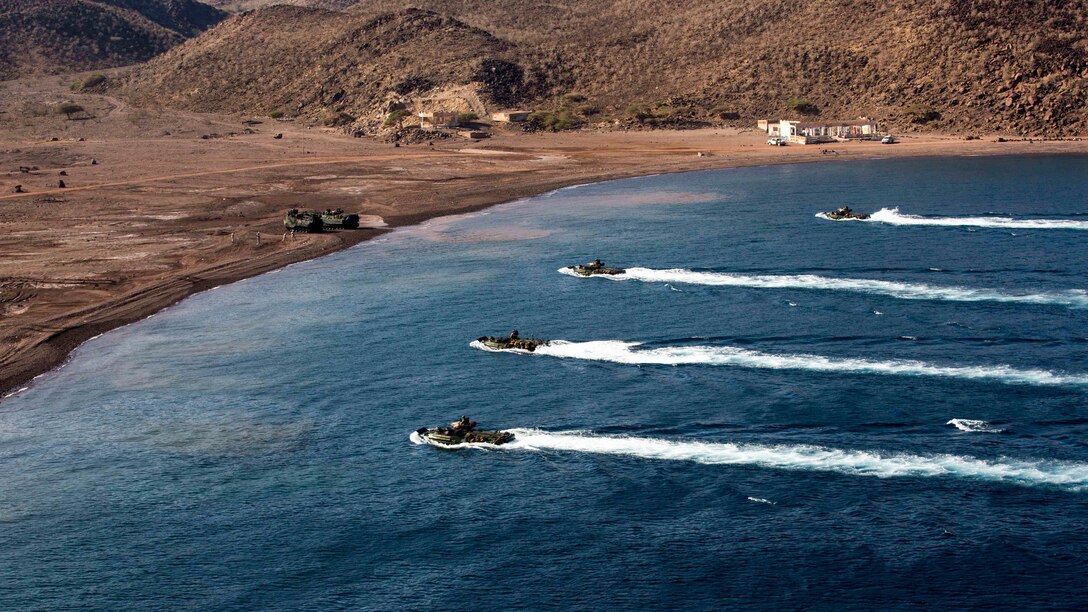 U.S. 5TH FLEET AREA OF OPERATIONS (Dec. 6, 2016) Amphibious assault vehicles with the 11th Marine Expeditionary Unit (MEU) prepare to land during the initial landing phases of Exercise Alligator Dagger, Dec. 6, 2016. The exercise involves all three ships of the Makin Island Amphibious Ready Group and enables the Marines and Sailors of the 11th MEU to conduct the comprehensive amphibious operations that keep their skills ready for crisis response and contingency operations throughout the Central Command area of responsibility. (U.S. Marine Corps photo by Cpl. Devan K. Gowans)