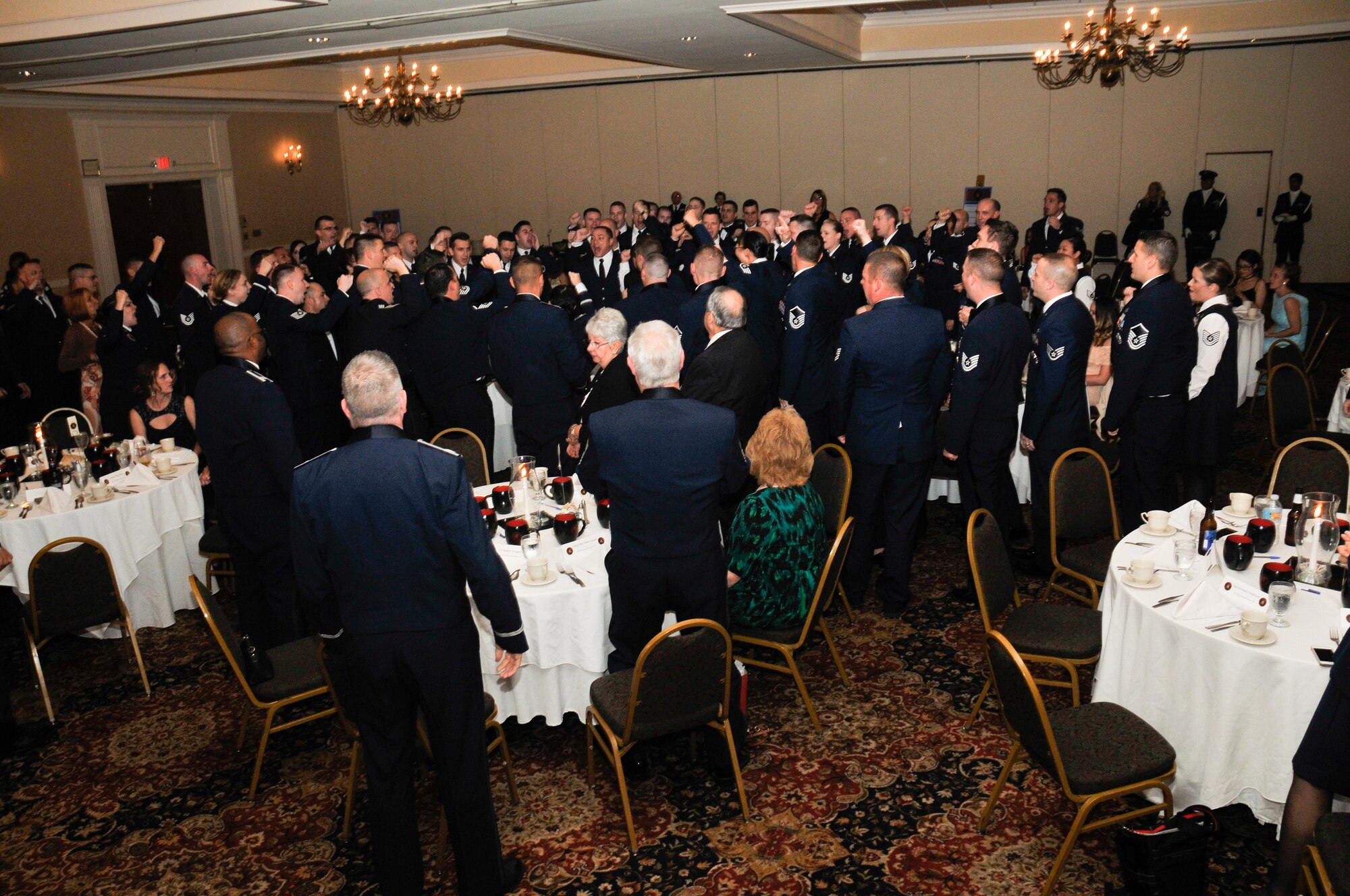 Members of the 319th Recruting Squadron rallied around one another as Chief Master Sgt. Michael Kovach led the squadron in the Recruiting mantra: “Boy! Am I enthusiastic!” Followed by the 319th’s motto: “Recruit…The Best! With…The Best! To Be…The Best!” during the squadron’s annual banquet in Sturbridge, Massachusetts, Nov. 2.