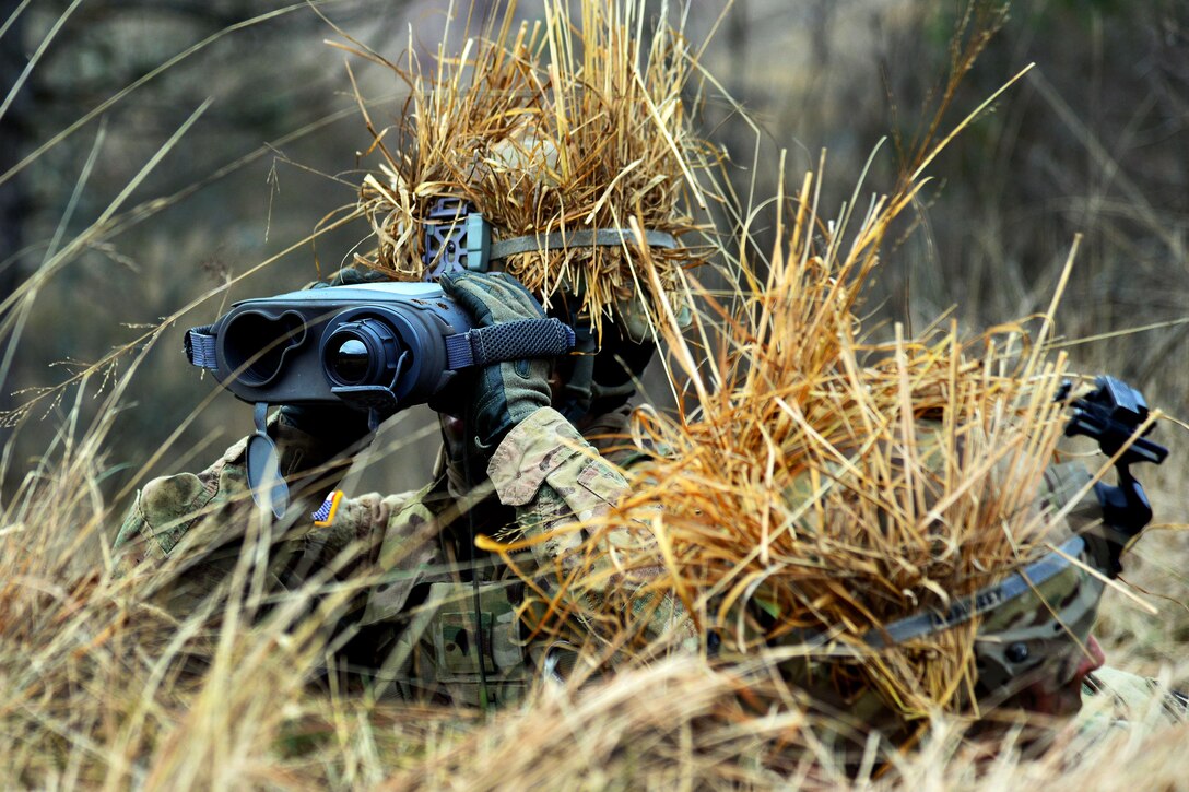 A soldier scans the battlefield while participating in a live-fire exercise during Exercise Mountain Shock at Pocek Range in Slovenia, Dec. 5, 2016. Army photo by Davide Dalla Massara