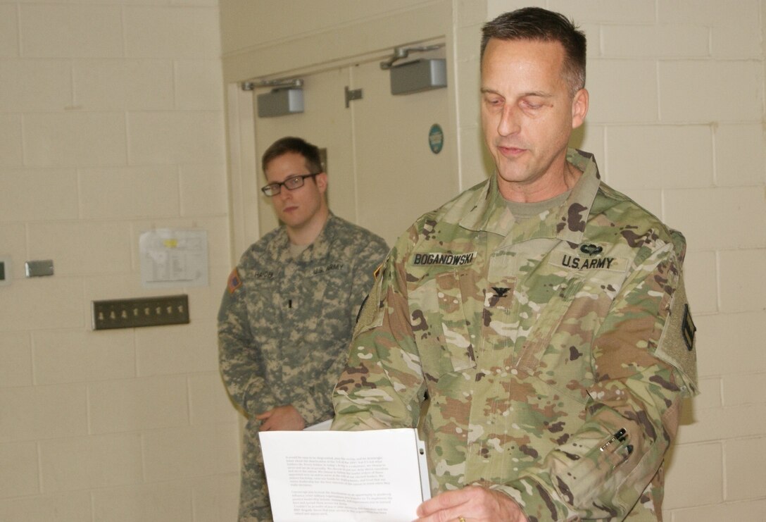 The 800th Logistics Support Brigade Commander Col. Bradly Boganowski shares his thoughts at the 3rd Battalion, 399th Regiment's deactivation ceremony at the Army Reserve Center in Sturtevant, Wis., Dec. 3, 2016.